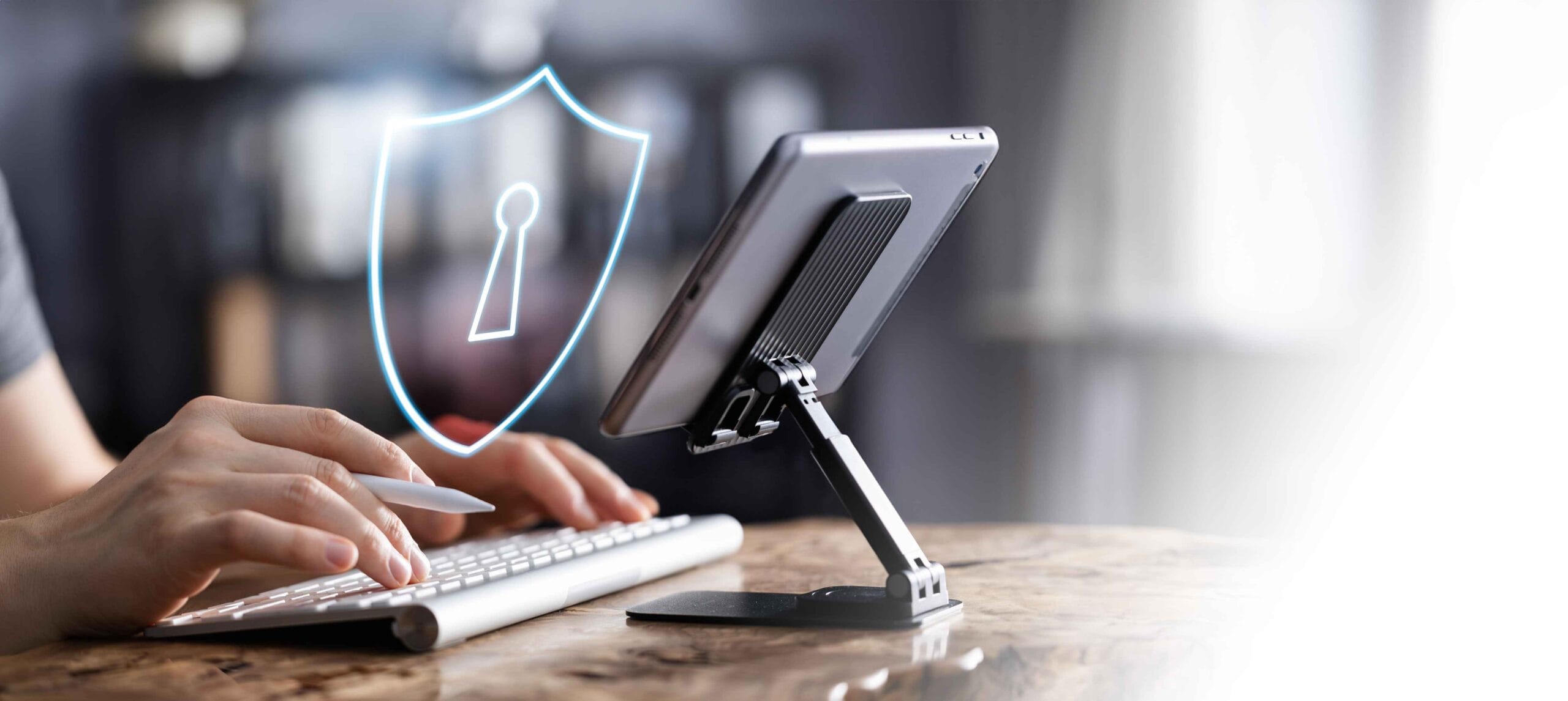 Working On IPad With Cybersecurity Hologram Icon